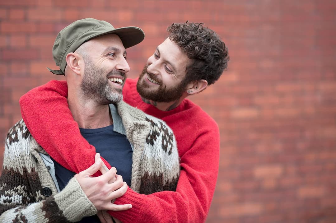 Gay couple hugging