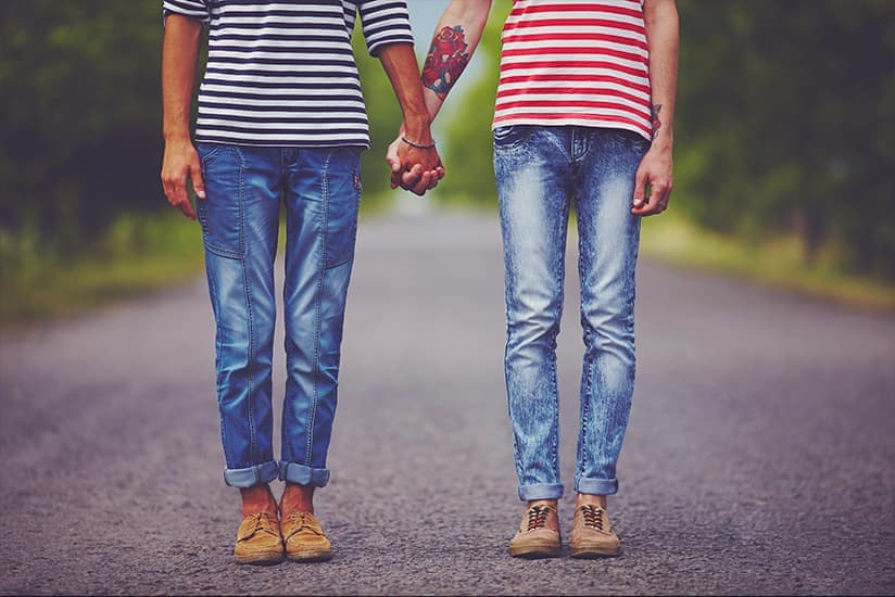 Gay couple holding hands